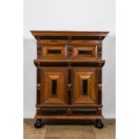 A Dutch partly ebonised oak four-door cupboard, 19th C.