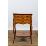 A French gilt bronze mounted three drawer side table, 19/20th C.