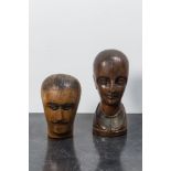 Two wooden head-shaped hat-shape models, 19th C.