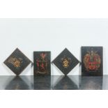 Four painted wooden armorial panels, 18th C.