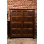 A Flemish gothic oak two-door cabinet with linenfold panels, 16th C. with later elements