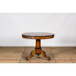 A dodecagonal tripod mahogany and root veneered parquetry table, 19th C.