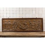 A large rectangular oak carving depicting 'The adoration of the shepherds', 18th C.