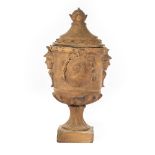 A large terracotta urn and cover with Roman busts and soldier heads, France or Italy, 18/19th C.