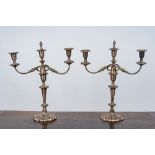 A pair of silver-plated three-light candlesticks, 20th C.