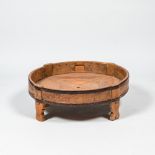 A fragment of a wooden barrel mounted as a base for a table, 19/20th C