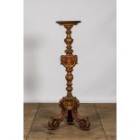 An Italian polychrome and gilt wooden church candlestick, 18th C