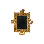 An impressive Italian gilt wooden baroque style mirror with cherubs, 19th C.