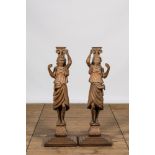 A pair of oak wooden caryatids on foot, 19th C.