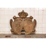 A gilt cast iron armorial wall plaque, 20th C.