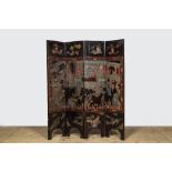 A Chinese lacquered four-part folding screen with a narrative 'palace' scene, 19/20th C.