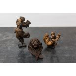 Three small wooden sculptures of putti, 16/17th C.