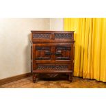 A wooden Gothic Revival buffet with older elements and wrought iron mounts, 19th C.