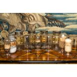 Eleven French glass pharmacy jars, 19th C.