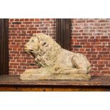 A sandstone model of a recumbent lion, 17/18th C.