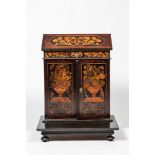 A mahogany floral marquetry secretaire on foot, 19th C. and earlier