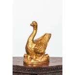 A French gilt and lacquered wooden goose, 19th C.