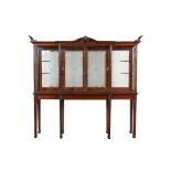 A neoclassical mahogany shop display cabinet with etched glass backdrops, England, ca. 1900