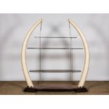 A large Žtagre with glass shelves set in faux ivory tusks, 20th C.