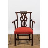An English mahogany upholstered armchair, 19th C.