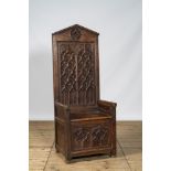 A large Gothic Revival walnut bishop chair or cathedra, 19th C.