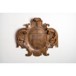 A large wooden relief with the arms of the city of Tournus, France, 18th C.