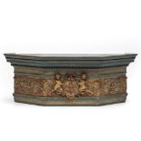 A polychrome wooden and alabaster armorial console with putti, 18th C.