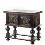 A rare ebonised wooden baluster leg table with polychromed reliefs, 17th C. with later elements