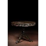 A black lacquered table with polychrome chinoiserie design and mother-of-pearl inlay, ca. 1900
