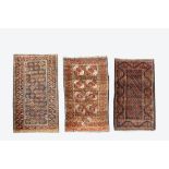 Three various Oriental rugs, wool on cotton, 20th C.