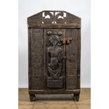 A decorative wooden African-inspired single-door cupboard, 20th C.