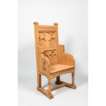 A French Gothic Revival white oak wooden armchair, 20th C.