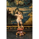 A polychromed wooden sculpture of Bacchus, 18th C.