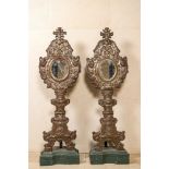 A pair of large gilt copper reliquaries mounted with mirror glass, probably Italy, 18/19th C.