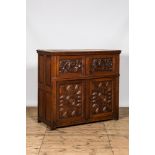 A Flemish oak wooden four-door cupboard with seahorses, 17th C. and later