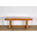 An Art Deco-style burl wood veneered table, 20th C.