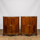 A pair of French mahogany corner cabinets with marble tops, 18/19th C.