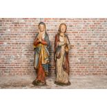 Two large polychromed and gilt walnut wooden figures of Mary and John the Baptist, Southern France o