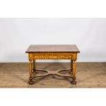 A Dutch veneered wooden table with floral marquetry, 19th C.