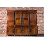 A large French oak two-part cupboard with eight doors and two drawers, Lorraine region, 18th C.