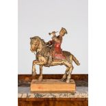 A polychrome wooden 'rider on horseback' sculpture, 18/19th C.