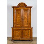 A German marquetry four-door 'deux-corps' cabinet with flowers and parrots, 18th C.