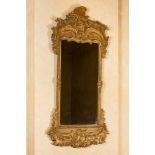 A gilt wooden rocaille mirror, France, 19th C.
