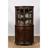 A Louis XV-style walnut corner display cabinet, 19th C.