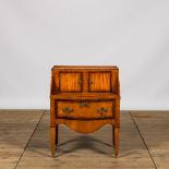 A Dutch Neoclassical fruitwooden bedside table, 19th C.