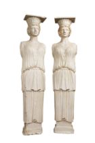 A pair of large plaster models of caryatids, 20th C.