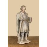 A polychromed limestone figure of a nobleman, probably France, 16th C.