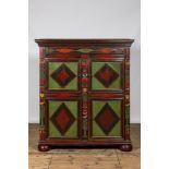 A polychrome wooden four-door cupboard, Alsace, 1st half 19th C.