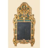 A French gilt wooden mirror with floral design, 19th C.