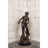 L.F. Moreau (19/20th C.): Fisherman, patinated bronze on a black marble base